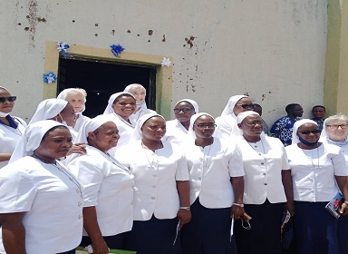 Some sisters of the Infant Jesus after Mass of the profession